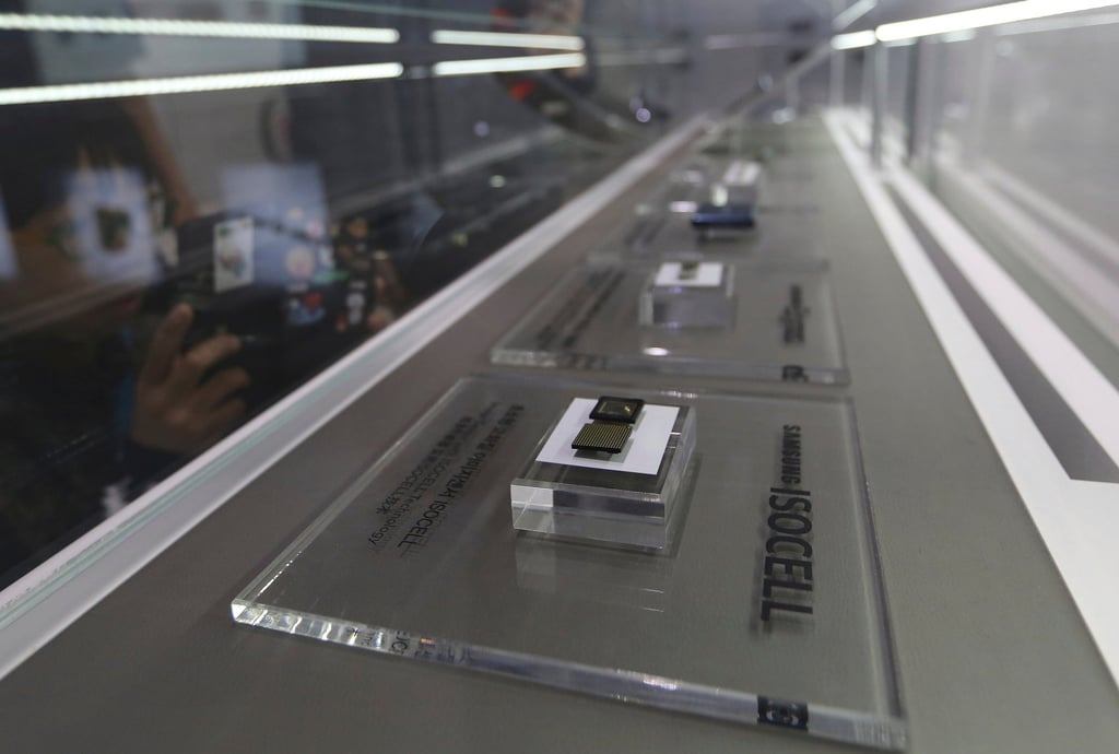 Samsung Electronics microchips are seen displayed at one of the company’s store in Seoul. Photo: AP