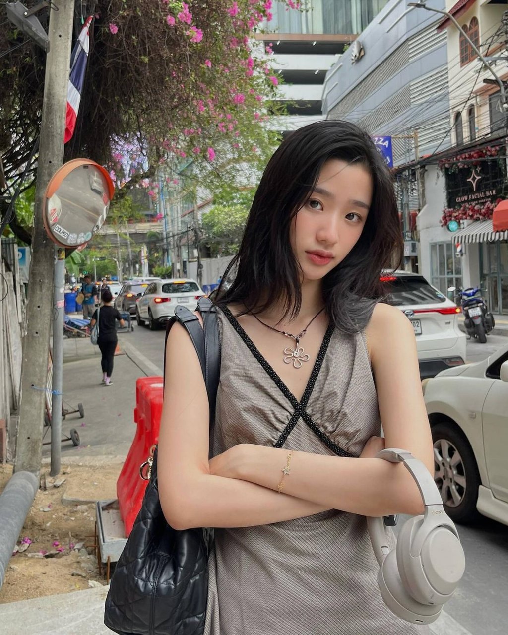 Tontawan “Tu” Tantivejakul poses on the streets of Bangkok. Photo: @tontawan/Instagram