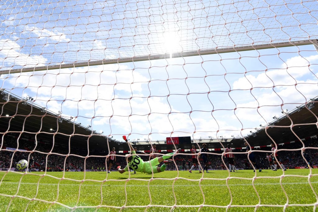Manchester United’s Marcus Rashford puts the ball past the despairing dive of Southampton goalkeeper Aaron Ramsdale. Photo: AFP Manchester United’s Marcus Rashford puts the ball past the despairing dive of Southampton goalkeeper Aaron Ramsdale. Photo: AFP