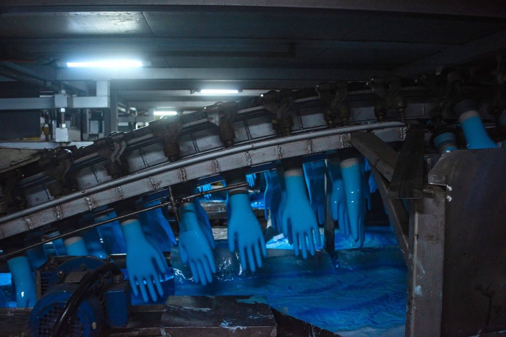 US tariffs on Chinese medical gloves are set to boost Malaysian glove makers, with shares of Top Glove and Hartalega surging as investors anticipate increased demand. Photo: Bloomberg US tariffs on Chinese medical gloves are set to boost Malaysian glove makers, with shares of Top Glove and Hartalega surging as investors anticipate increased demand. Photo: Bloomberg