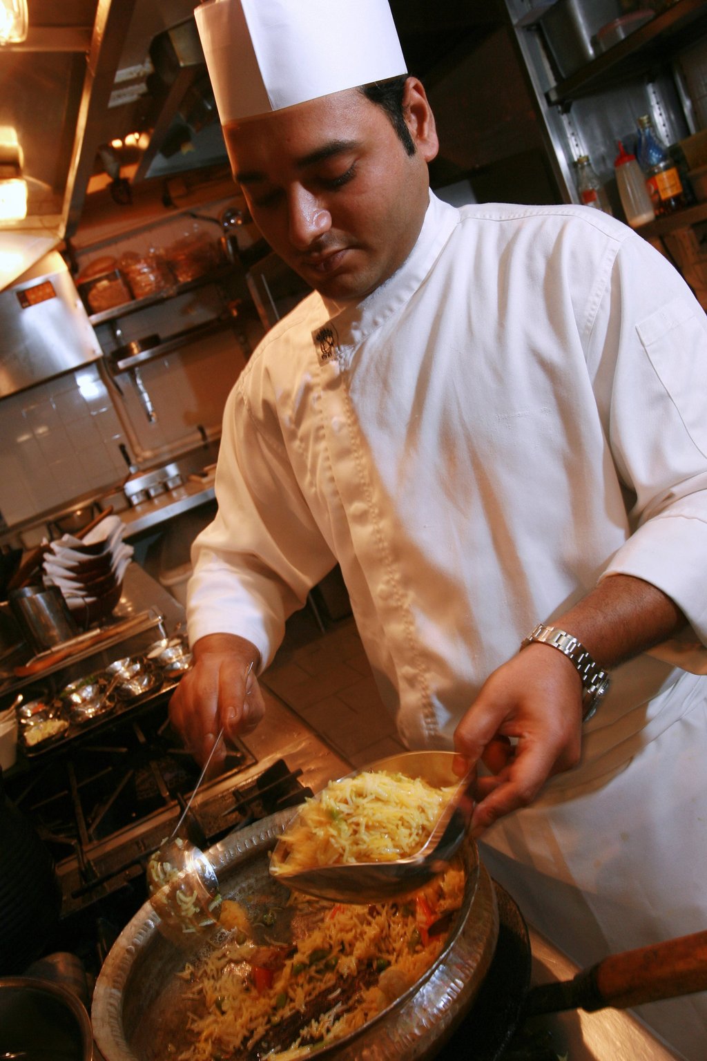 Chef Palash Mitra making vegetable pulao, a rice dish, at Veda in 2006. Photo: SCMP Chef Palash Mitra making vegetable pulao, a rice dish, at Veda in 2006. Photo: SCMP