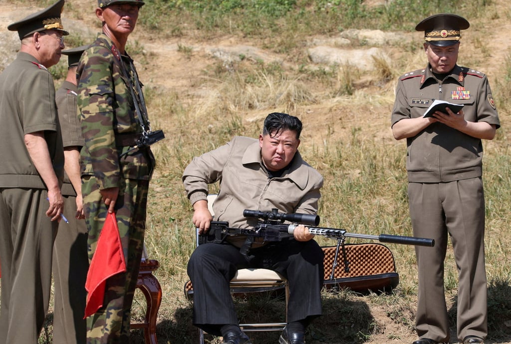 Kim Jong-un holds a scoped rifle during a visit to a military training base this month. Photo: KCNA via Reuters Kim Jong-un holds a scoped rifle during a visit to a military training base this month. Photo: KCNA via Reuters