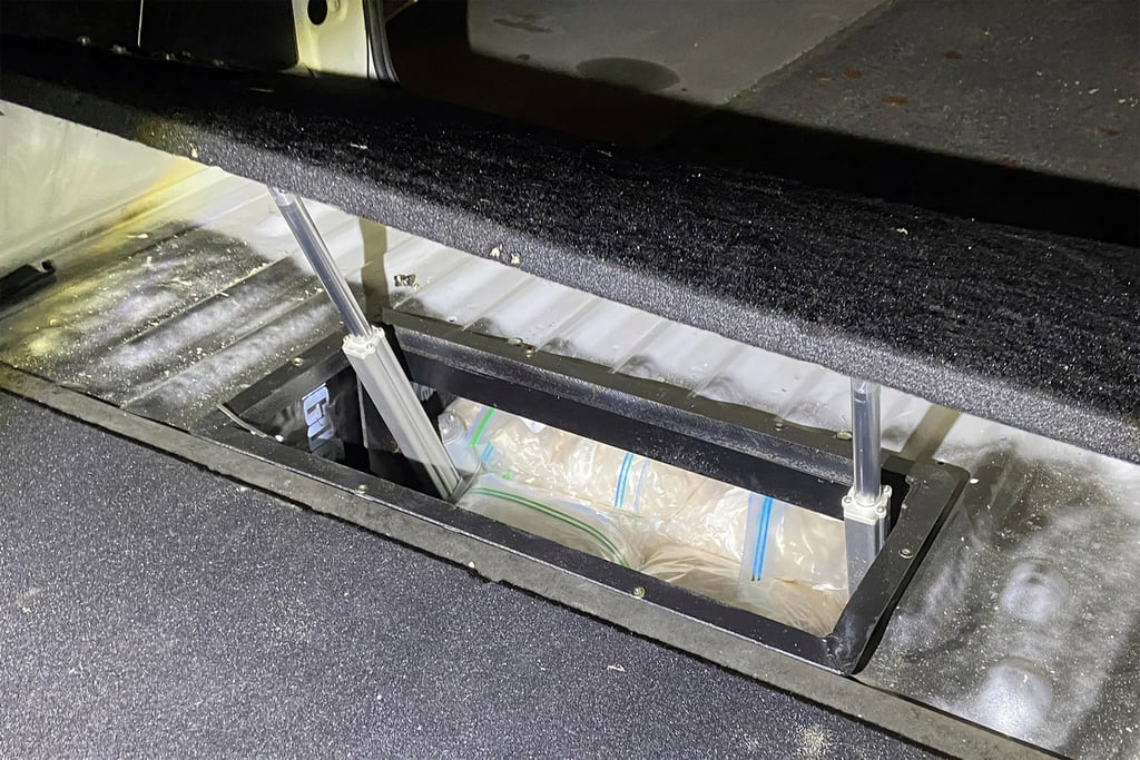 Drugs are found in a concealed compartment in a vehicle after Australia’s police penetrated an encrypted global communications app developed for criminals called Ghost, leading to dozens of arrests. Photo: AP