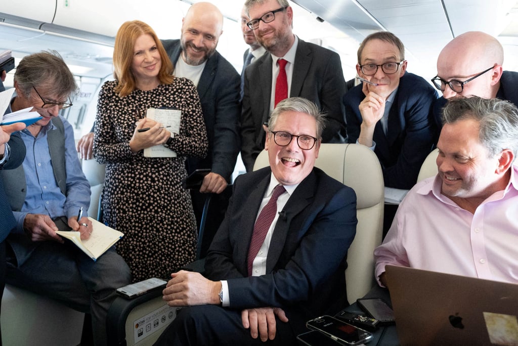 Britain’s Prime Minister Keir Starmer on board his plane as he flies to Washington. File photo: Reuters