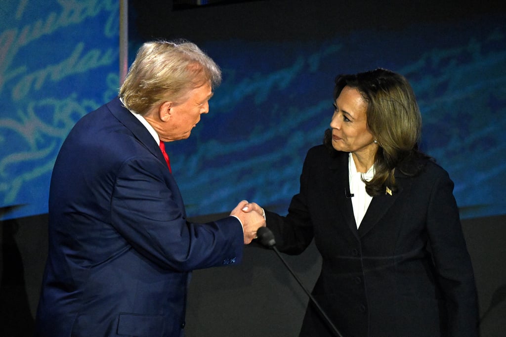 US Vice-President and Democratic presidential candidate Kamala Harris (right) shakes hands with former US president and Republican presidential candidate Donald Trump on September 10. Photo: AFP