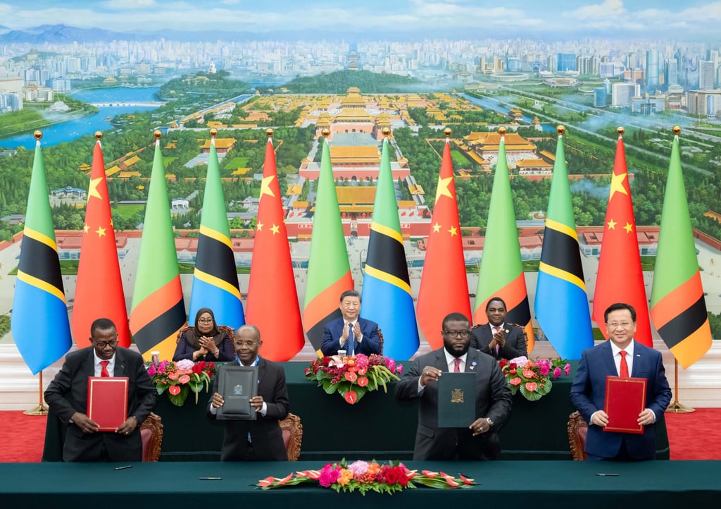 Leaders Xi Jinping, Samia Suluhu Hassan and Hakainde Hichilema (at back) witness the signing of a memorandum of understanding on the revitalisation project of the Tazara railway, on the sidelines of the 2024 FOCAC summit. Photo: Xinhua