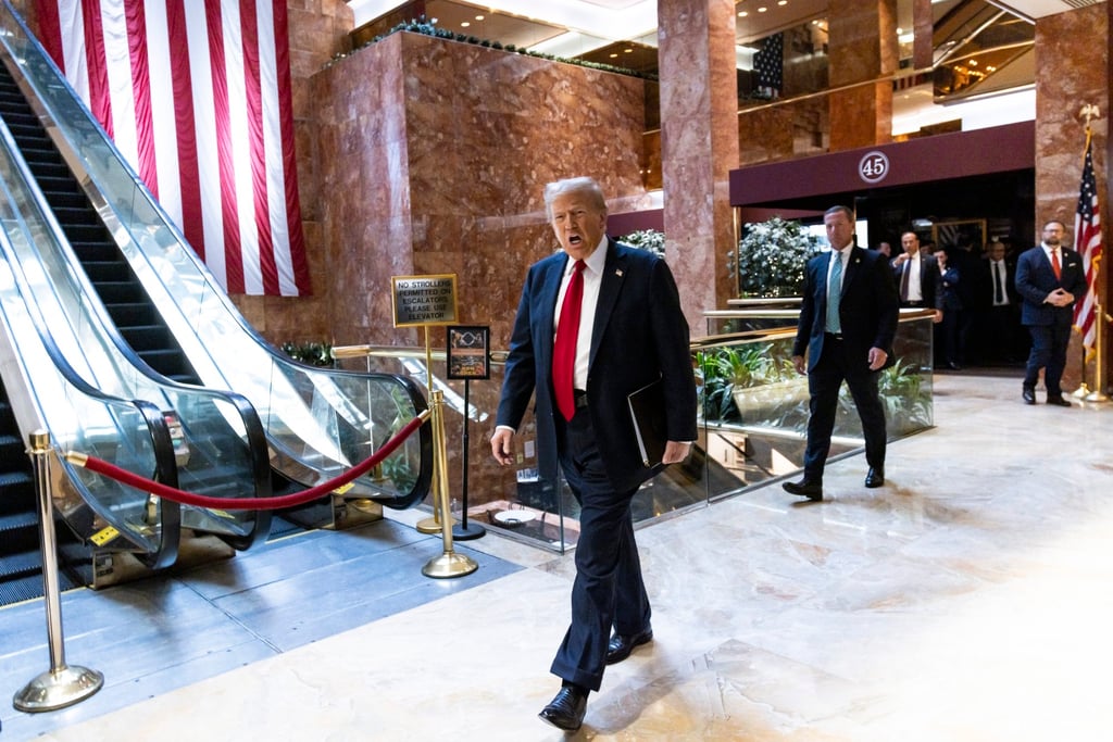 Donald Trump in the lobby of Trump Tower in New York earlier on Thursday. Photo: EPA-EFE
