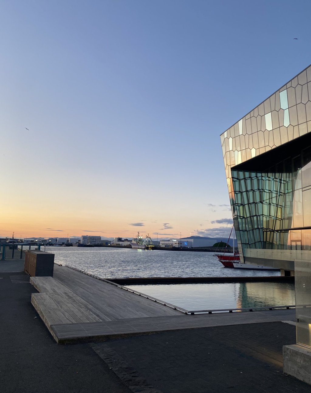 Harpa Concert Hall and Conference Centre and Reykjavík’s harbour at sunset. Photo: Leanne Mirandilla