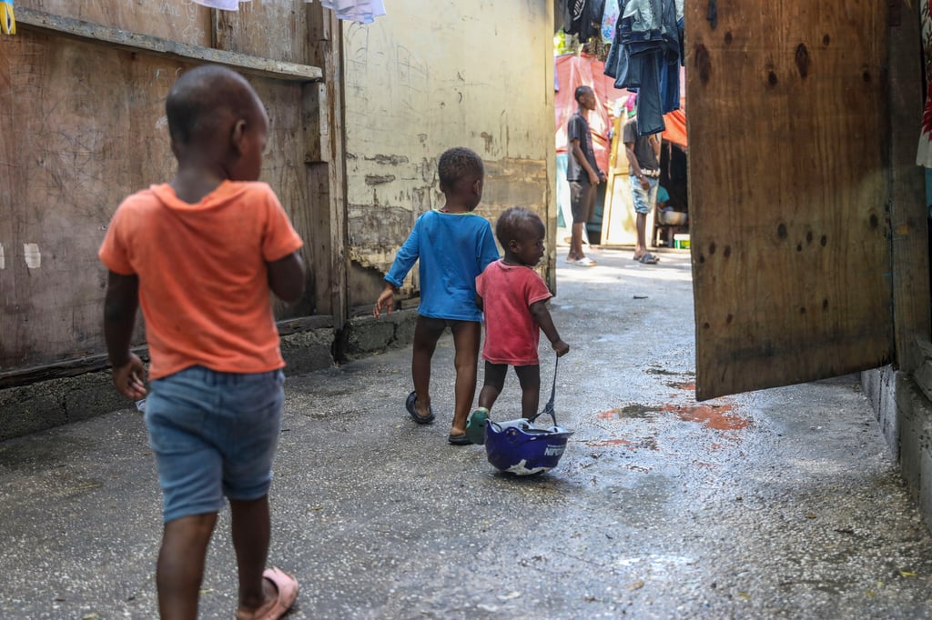 Children play inside a school where families displaced by gang violence have been taking refuge for over a year in Port-au-Prince, Haiti. Photo: AP Children play inside a school where families displaced by gang violence have been taking refuge for over a year in Port-au-Prince, Haiti. Photo: AP