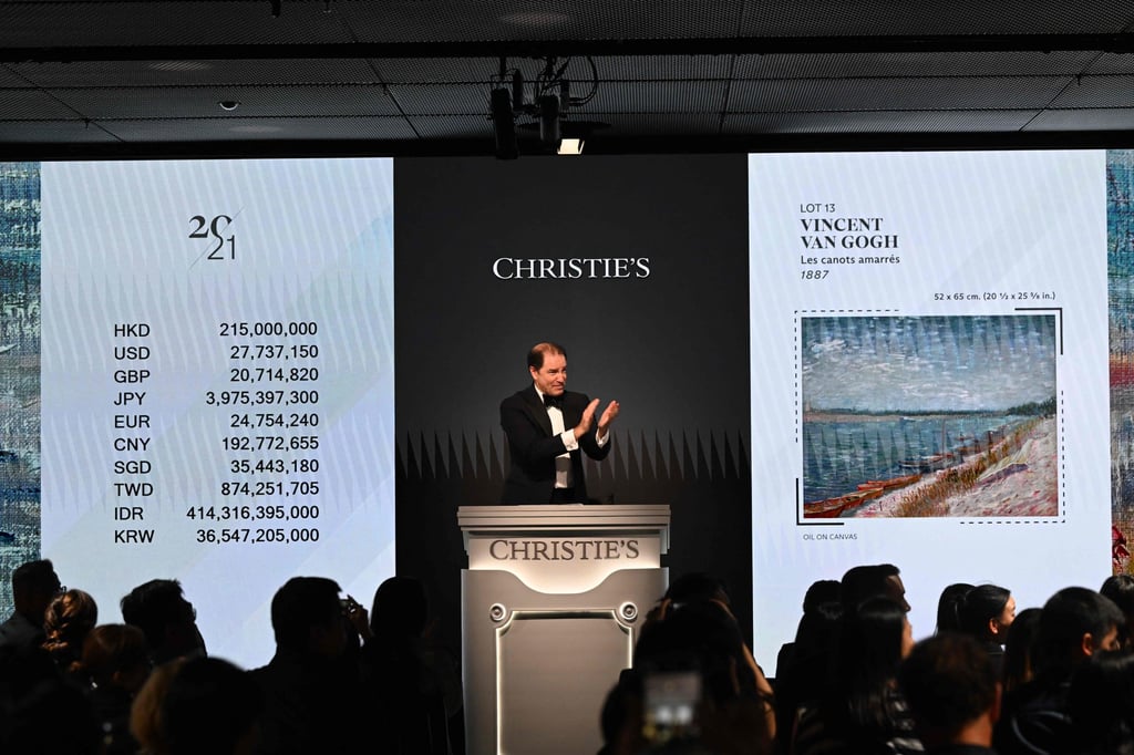 Bids are taken on Vincent van Gogh’s Les canots amarrés at Christie’s new Asia headquarters in Hong Kong on September 26. Photo: AFP Bids are taken on Vincent van Gogh’s Les canots amarrés at Christie’s new Asia headquarters in Hong Kong on September 26. Photo: AFP