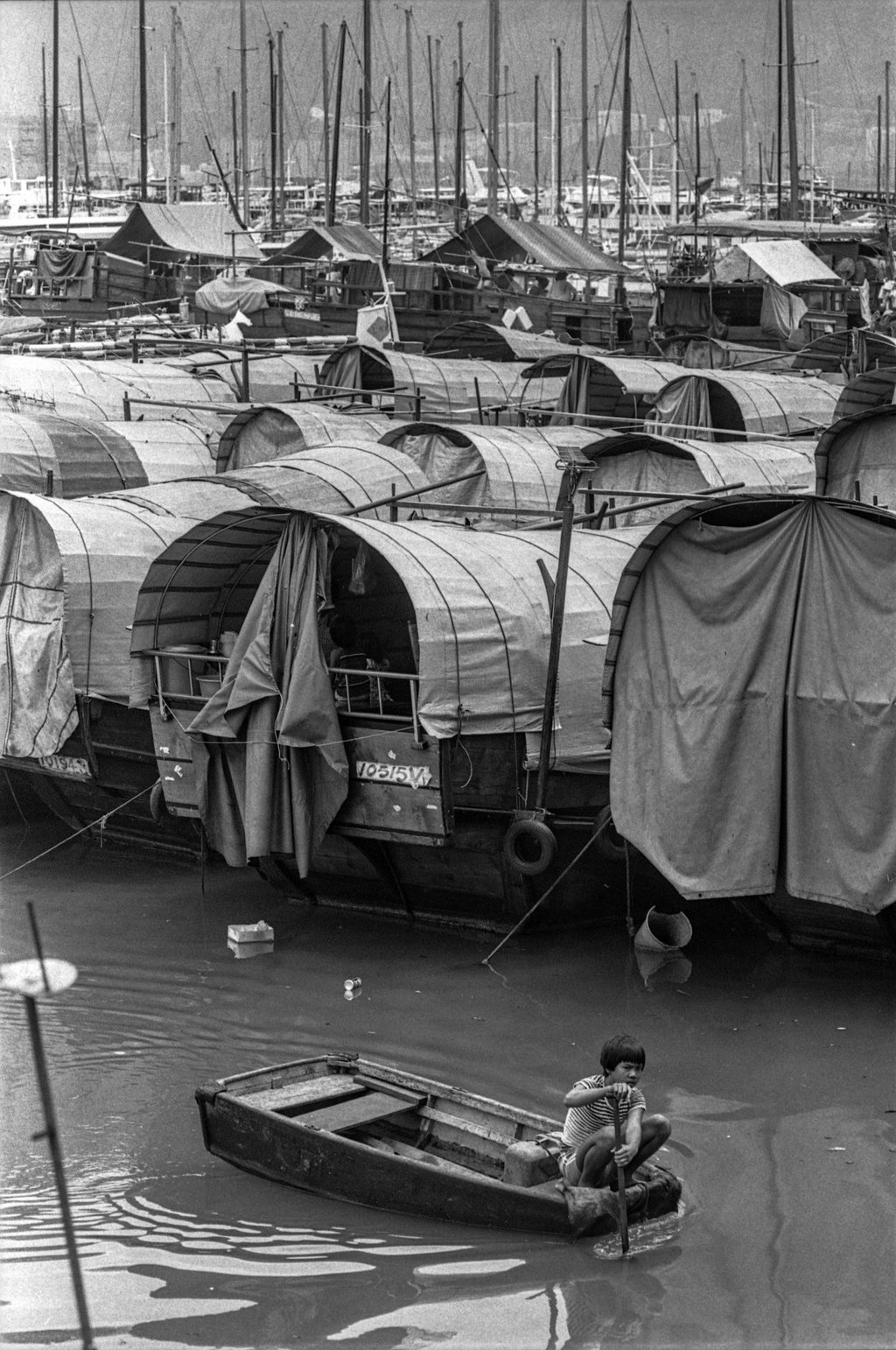 A child on a small sampan in the Causeway Bay Typhoon Shelter in 1979. Photo: SCMP A child on a small sampan in the Causeway Bay Typhoon Shelter in 1979. Photo: SCMP