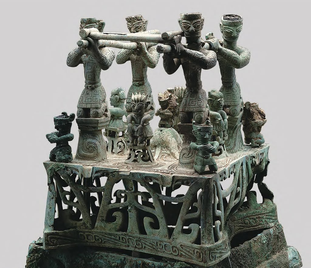 A platform adorned with 13 bronze figures is among the dazzling relics recovered from the Sanxingdui pits between 2020 and 2022. Photo: Sichuan Cultural Relics