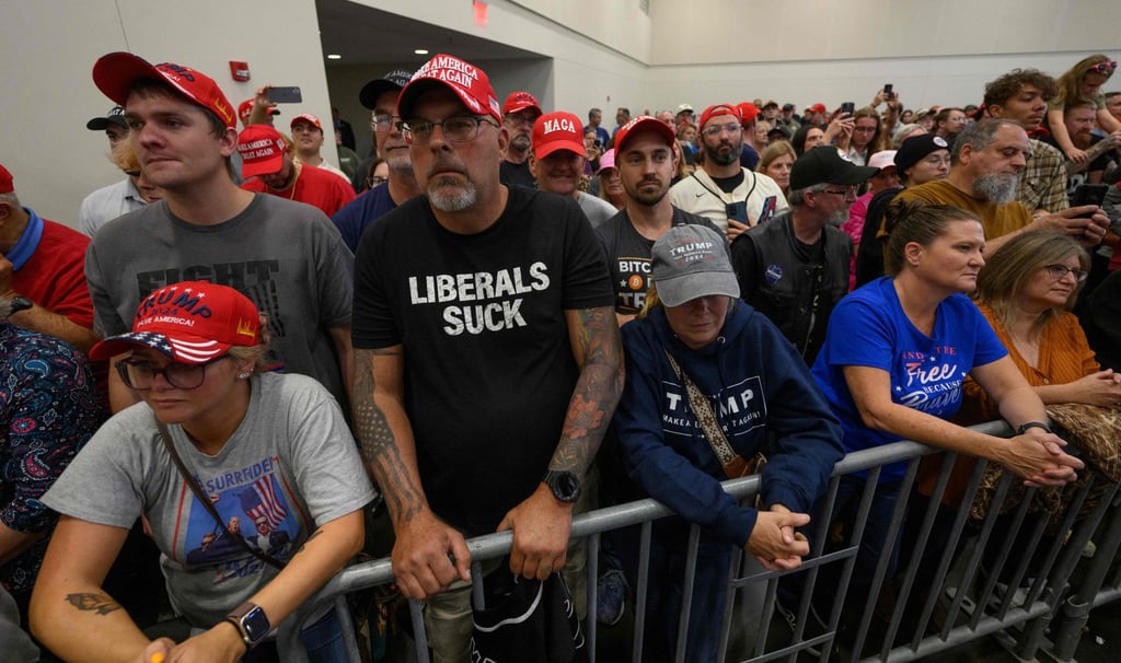Trump supporters listens to the Republican presidential nominee speak at a campaign rally at the Bayfront Convention Centre in Erie, Pennsylvania on Sunday. Photo: Getty Images via AFP
