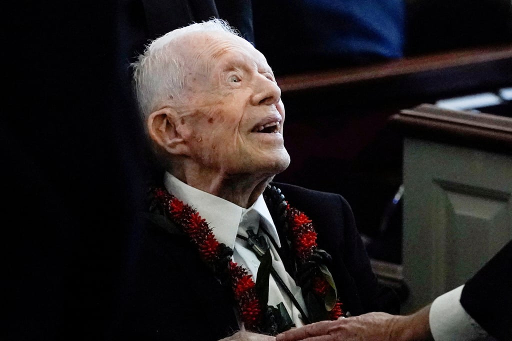 Former US President Jimmy Carter departs after the funeral service for former US first lady Rosalynn Carter at Maranatha Baptist Church, in Plains, Georgia on November 29, 2023. Photo: Pool/Reuters