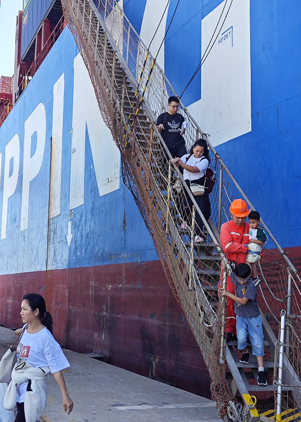Chinese evacuees disembark at a port in Cyprus on Tuesday after arriving from Lebanon. Photo: Xinhua