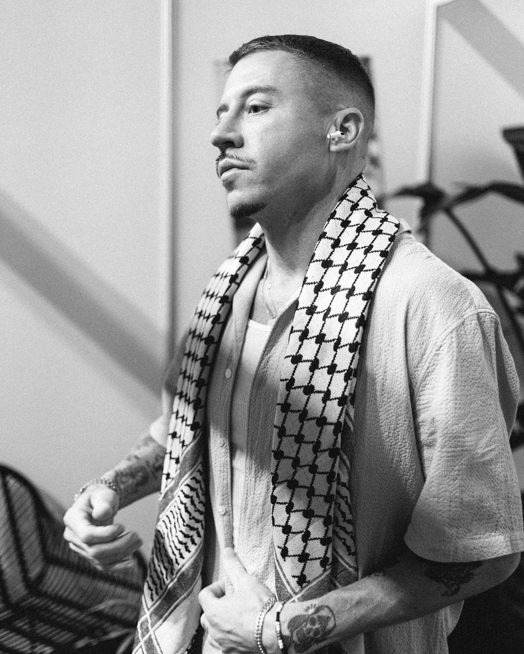 Rapper Macklemore wears the Palestinian keffiyeh scarf in Bratislava, Slovakia, at the Lovestream Festival. Photo: @macklemore/Instagram