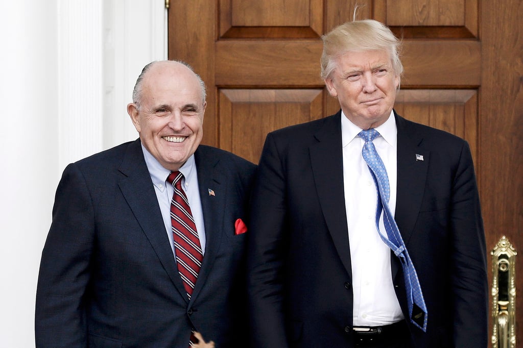 Former New York City Mayor Rudy Giuliani poses with former US President Donald Trump at the Trump International Golf Club in November 2016. Photo: EPA-EFE Former New York City Mayor Rudy Giuliani poses with former US President Donald Trump at the Trump International Golf Club in November 2016. Photo: EPA-EFE