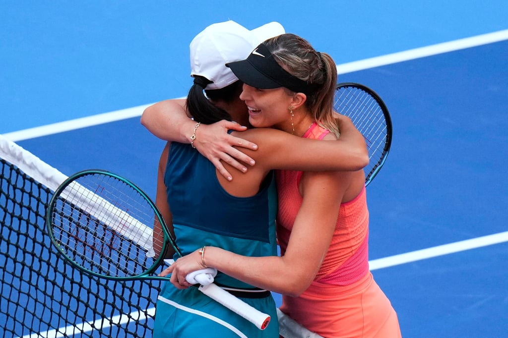 Paula Badosa of Spain (right) hugs Zhang Shuai after winning their quarter-final in straight sets. Photo: AP Paula Badosa of Spain (right) hugs Zhang Shuai after winning their quarter-final in straight sets. Photo: AP
