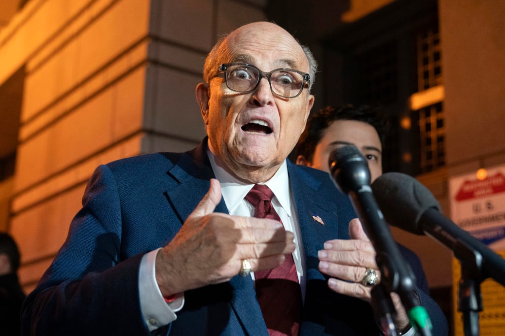 Former New York Mayor Rudy Giuliani talks to reporters as he leaves the federal courthouse in Washington in December 2023. Photo: AP Photo Former New York Mayor Rudy Giuliani talks to reporters as he leaves the federal courthouse in Washington in December 2023. Photo: AP Photo