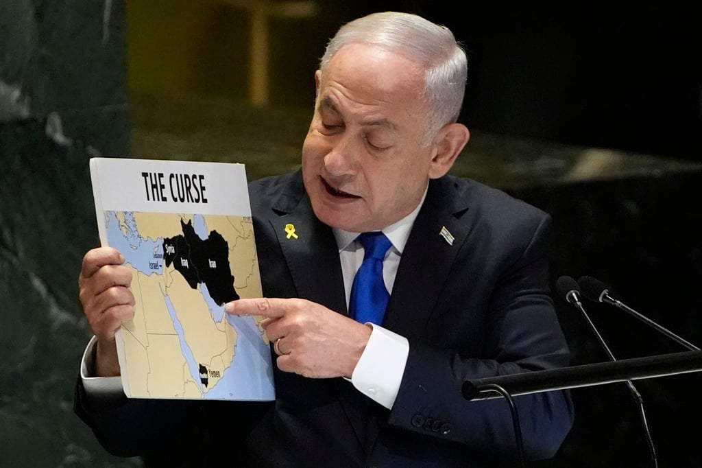 Israeli Prime Minister Benjamin Netanyahu holds a placard labelling Iran as part of “the curse” as he addresses the United Nations General Assembly on September 27. Photo: AP Israeli Prime Minister Benjamin Netanyahu holds a placard labelling Iran as part of “the curse” as he addresses the United Nations General Assembly on September 27. Photo: AP