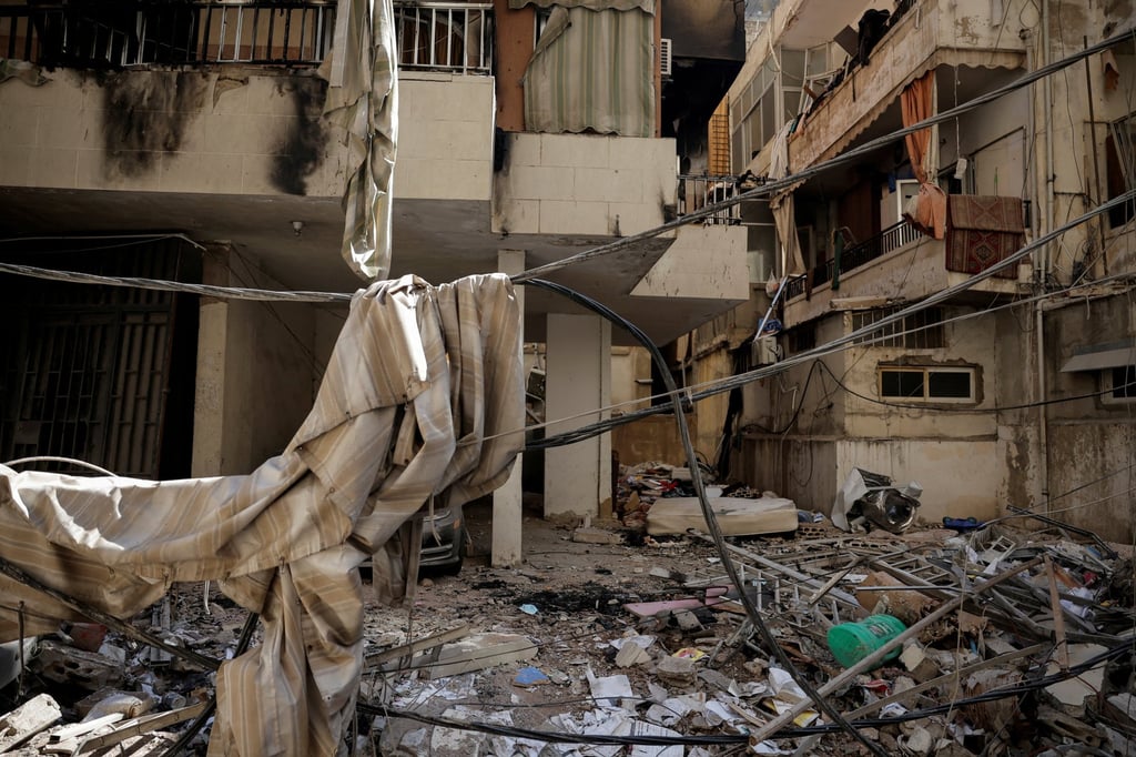 Rubble around a damaged building in the aftermath of Israeli strikes in the Chiyah area of Dahiyeh, Beirut, Lebanon on Saturday. Photo: Reuters