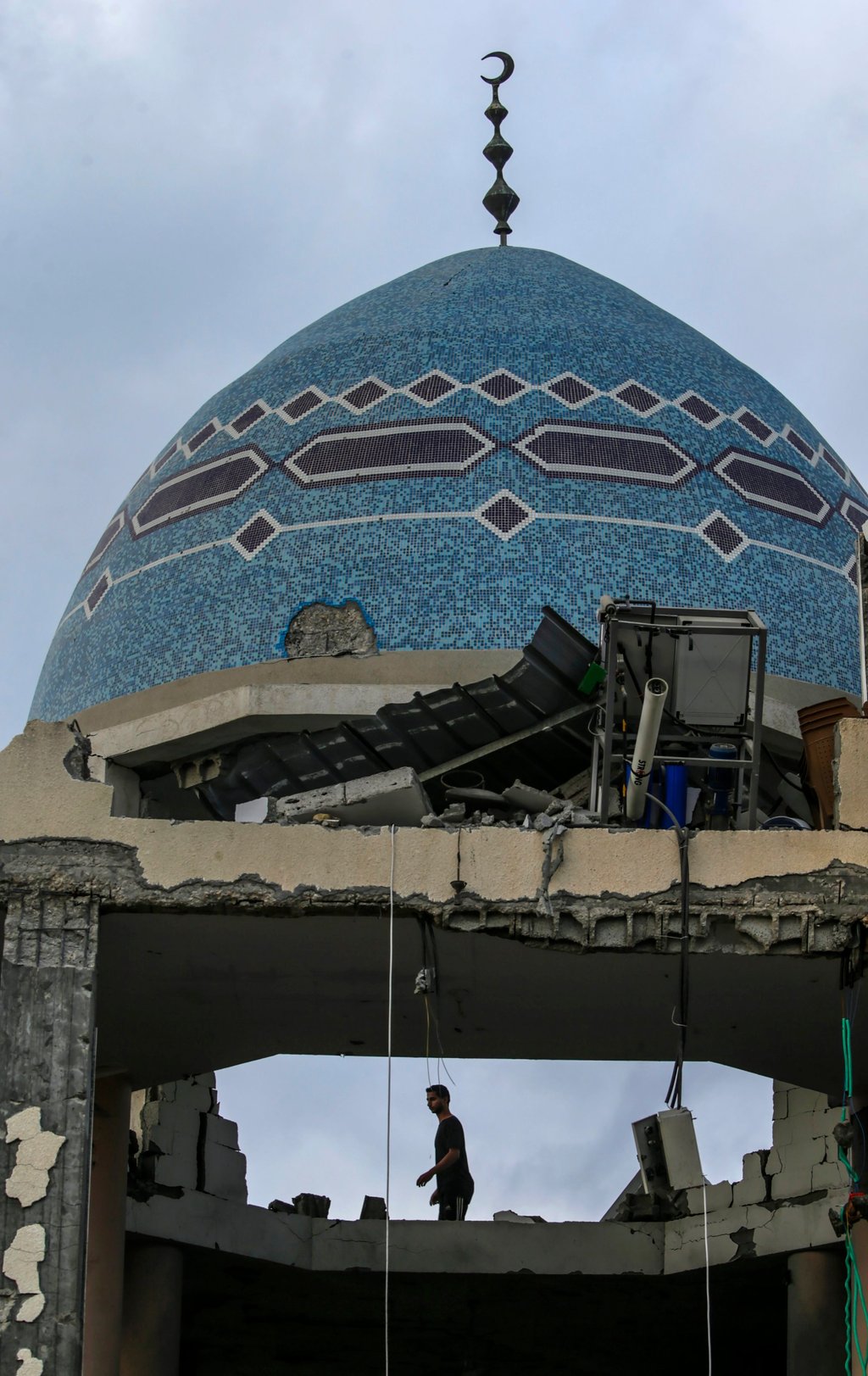 A Palestinian man inspects the rubble of the destroyed al-Aqsa Martyrs mosque following an Israeli strike in Deir al-Balah, central Gaza on Sunday. Photo: EPA-EFE A Palestinian man inspects the rubble of the destroyed al-Aqsa Martyrs mosque following an Israeli strike in Deir al-Balah, central Gaza on Sunday. Photo: EPA-EFE