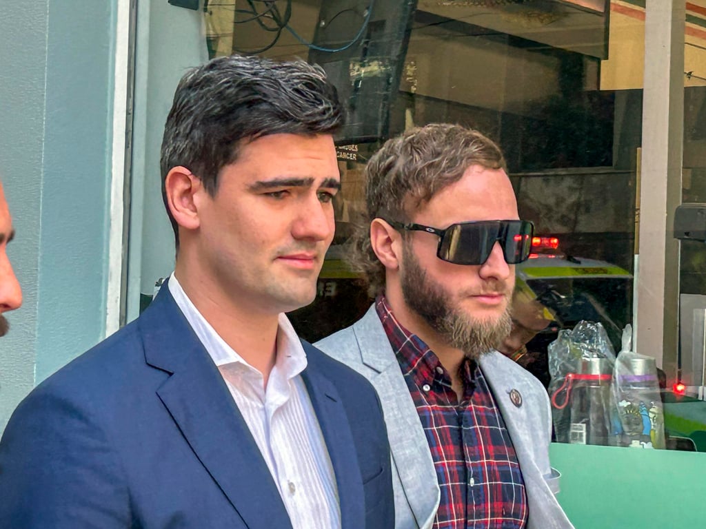 Jacob Hersant (left) walks from the Melbourne Magistrates Court in Melbourne. Photo: AP Jacob Hersant (left) walks from the Melbourne Magistrates Court in Melbourne. Photo: AP