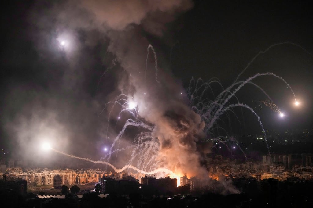 Flames and smoke rise from an Israeli air strike in Beirut, Lebanon, on Sunday. Photo: AP Flames and smoke rise from an Israeli air strike in Beirut, Lebanon, on Sunday. Photo: AP