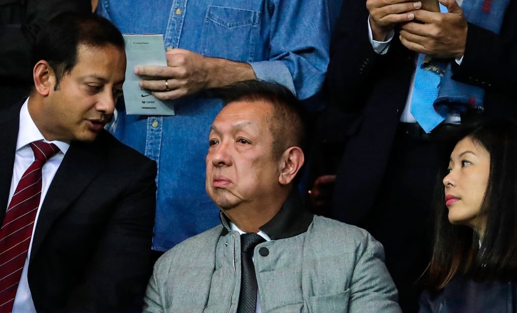 Singaporean businessman Peter Lim (centre) was initially well received Valencia. Photo: AFP