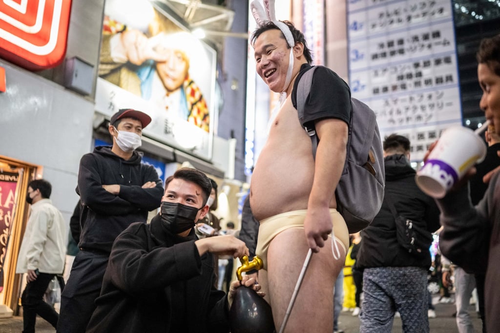 Revellers take part in Halloween celebrations in Tokyo’s Shibuya district in 2022. Photo: AFP