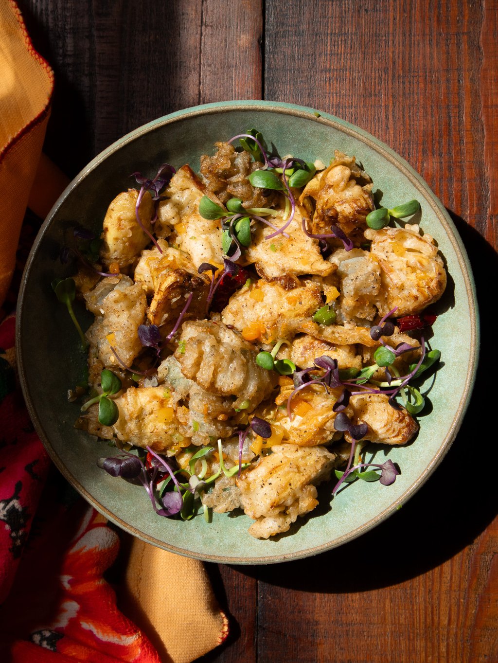 Salt and pepper “squid” is actually made with chewy konnyaku yam cake and artichoke hearts. Photo: Christine Wong