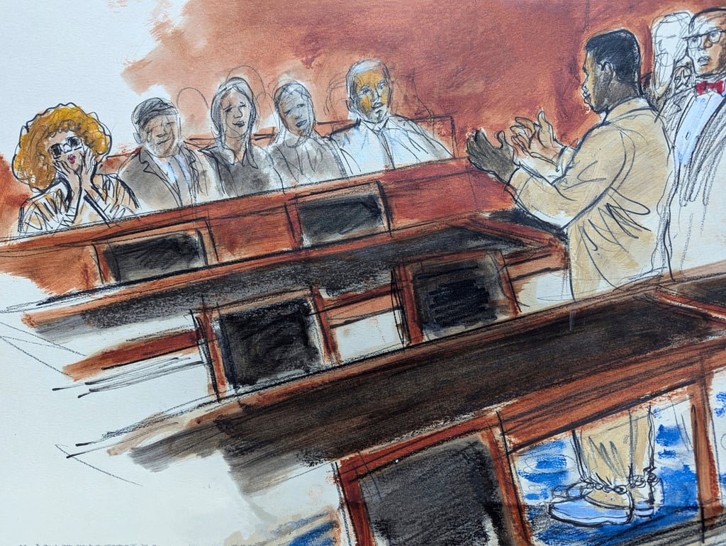 Sean ‘Diddy’ Combs, right, in shackles, gestures to his mother, far left, who is blowing kisses to him. Photo: Elizabeth Williams via AP