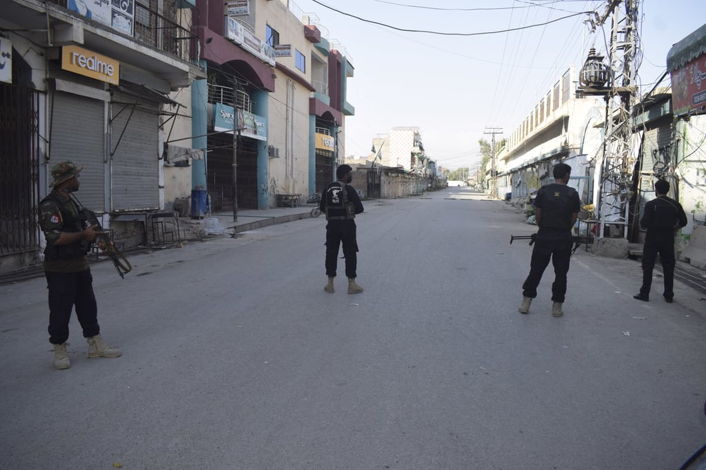 Pakistani security officials stand guard in Bannu, Pakistan on Monday following an attack on police. Photo: EPA-EFE Pakistani security officials stand guard in Bannu, Pakistan on Monday following an attack on police. Photo: EPA-EFE