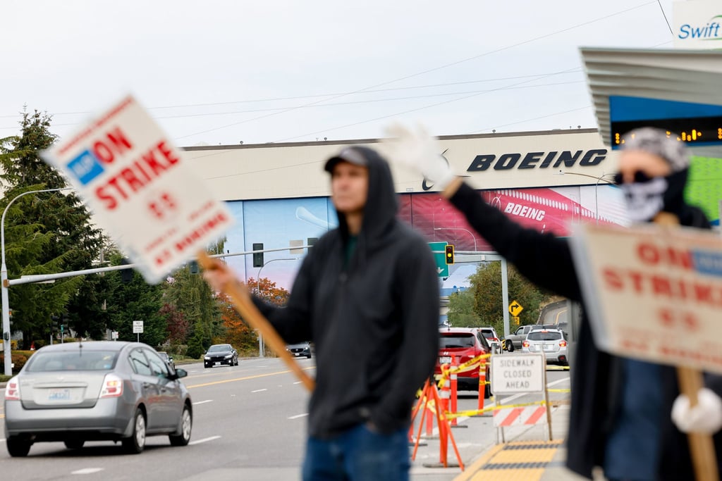 Picketers outside the Boeing plant in Everett, Washington on Friday. Photo: The Seattle Times via TNS Picketers outside the Boeing plant in Everett, Washington on Friday. Photo: The Seattle Times via TNS