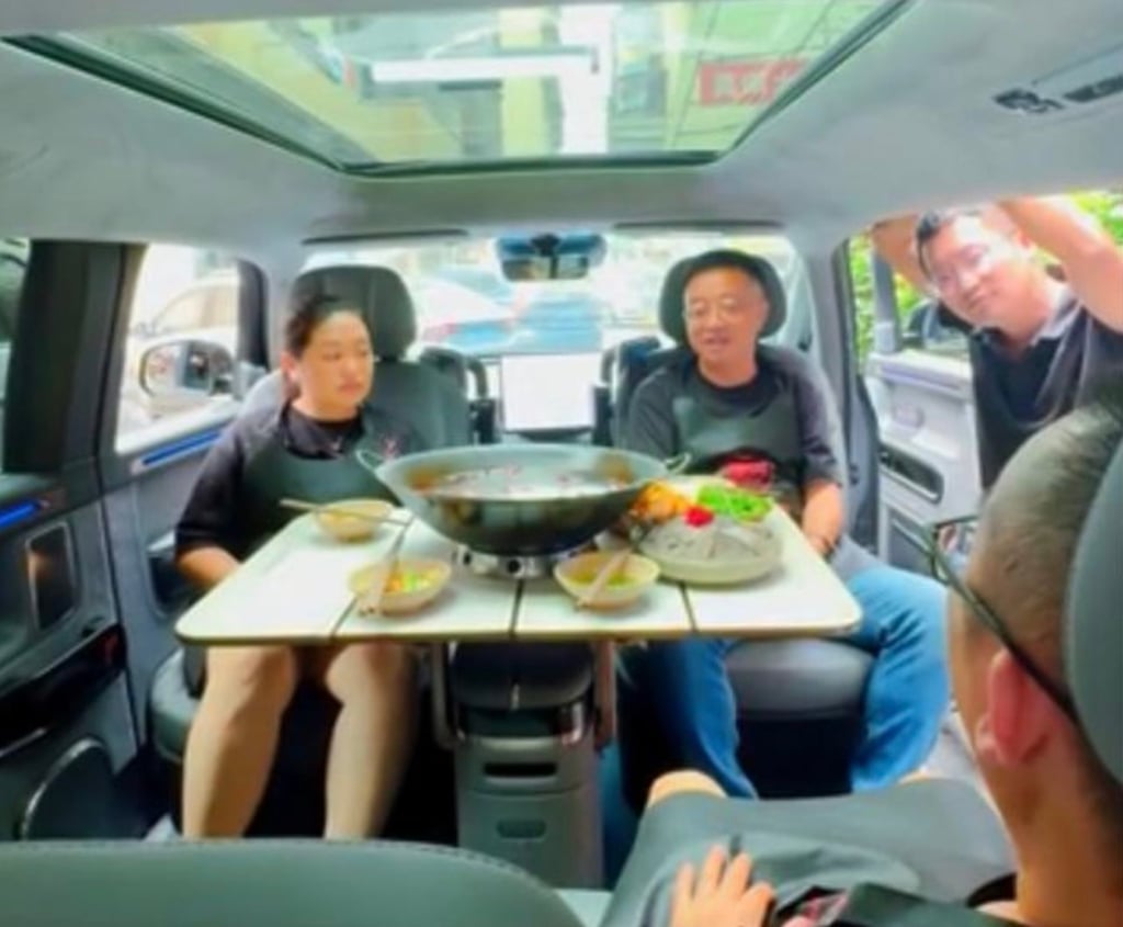 The video depicting Yang, middle, and his guests enjoying a hotpot meal aims to showcase the spacious interior, multifunctionality, and comfort levels of the new model. Photo: Baidu
