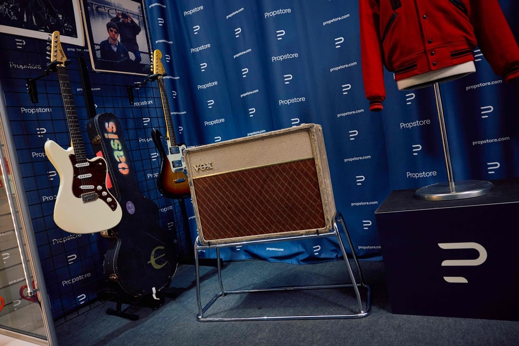 John Lennon’s first ever Vox amp, and Noel Gallagher’s autographed first Cream Hohner JT60 guitar. Photo: AFP John Lennon’s first ever Vox amp, and Noel Gallagher’s autographed first Cream Hohner JT60 guitar. Photo: AFP