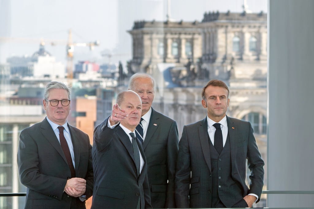 (From left) British Prime Minister Keir Starmer, German Chancellor Olaf Scholz, US President Joe Biden and French President Emmanuel Macron meet in front of the Reichstag Building in Berlin. Photo: EPA-EFE