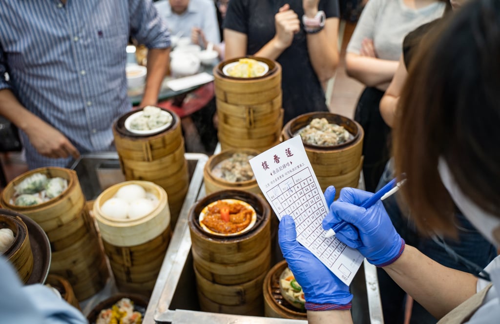 A server marks an order at Lin Heung Lau. Photo: Alexander Mak A server marks an order at Lin Heung Lau. Photo: Alexander Mak
