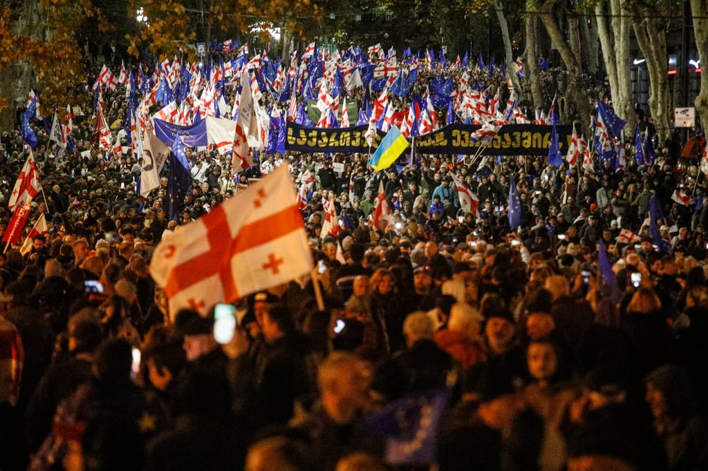 People wave EU and Georgian flags in a pro-Europe rally in Tbilisi, Georgia. Photo: EPA-EFE People wave EU and Georgian flags in a pro-Europe rally in Tbilisi, Georgia. Photo: EPA-EFE