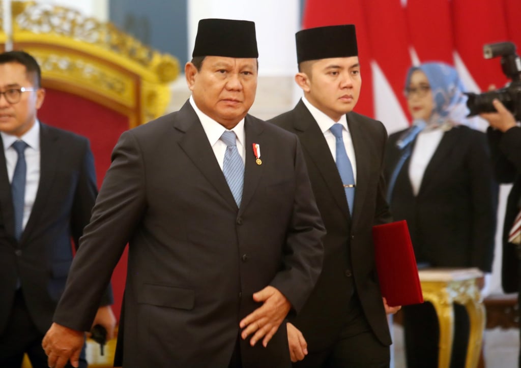 Indonesia’s President Prabowo Subianto walks in to lead the inauguration of his ministers in Jakarta on Monday. Photo: EPA-EFE Indonesia’s President Prabowo Subianto walks in to lead the inauguration of his ministers in Jakarta on Monday. Photo: EPA-EFE