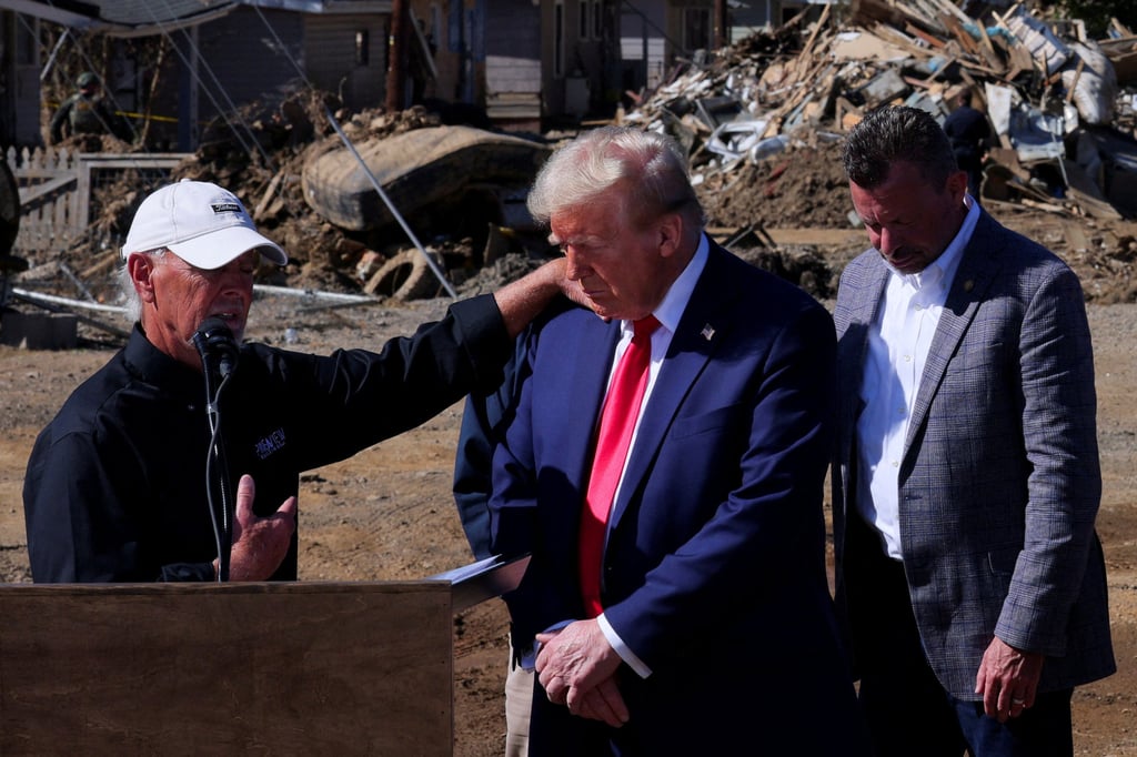 Donald Trump visits an area damaged by Hurricane Helene in Swannanoa, North Carolina. Photo: Reuters