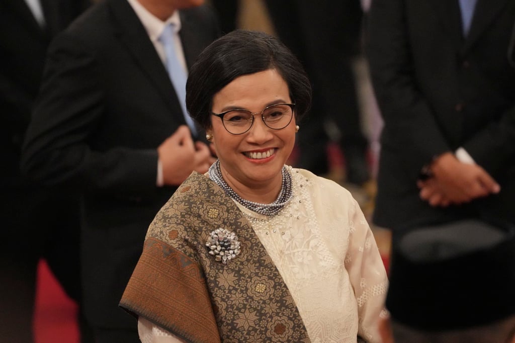 Indonesia’s newly appointed Finance Minister Sri Mulyani Indrawati at the swearing-in ceremony of the new cabinet ministers at the presidential palace in Jakarta on Monday. Photo: AP Indonesia’s newly appointed Finance Minister Sri Mulyani Indrawati at the swearing-in ceremony of the new cabinet ministers at the presidential palace in Jakarta on Monday. Photo: AP