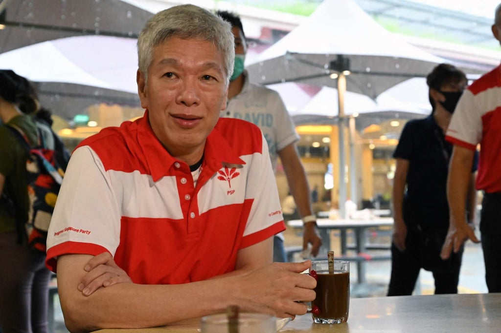 Lee Hsien Yang, the brother of then Singapore’s prime minister Lee Hsien Loong, seen wearing a shirt of the opposition Progress Singapore Party, attends an event at a market in 2020. Photo: AFP