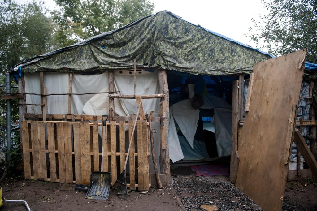 A housing structure, including a tent, is seen in a makeshift homeless encampment set up in a park in Granby, Quebec, Canada, in September 2023. Photo: AFP