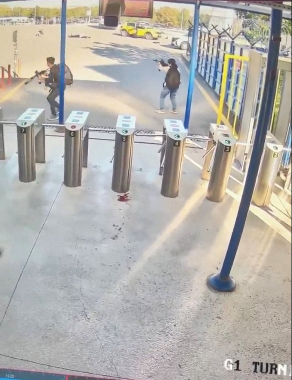 Armed attackers on security camera footage. Photo: Reuters