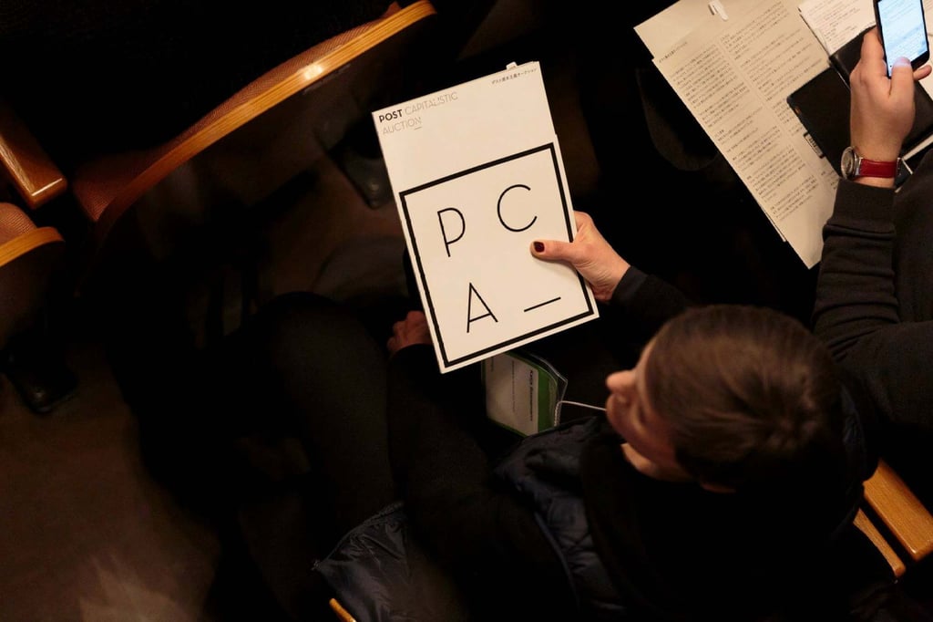 Potential bidders can make imaginative offers for an artwork, with the artist ultimately choosing the winning bid after considering advice from a panel of experts during each Post Capitalistic Auction show. Potential bidders can make imaginative offers for an artwork, with the artist ultimately choosing the winning bid after considering advice from a panel of experts during each Post Capitalistic Auction show.