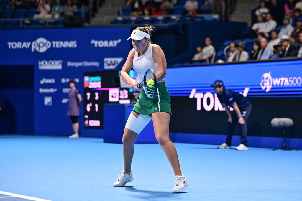 Sofia Kenin, playing with her right thigh heavily strapped, dropped just one set on her way to the final. Photo: AFP Sofia Kenin, playing with her right thigh heavily strapped, dropped just one set on her way to the final. Photo: AFP