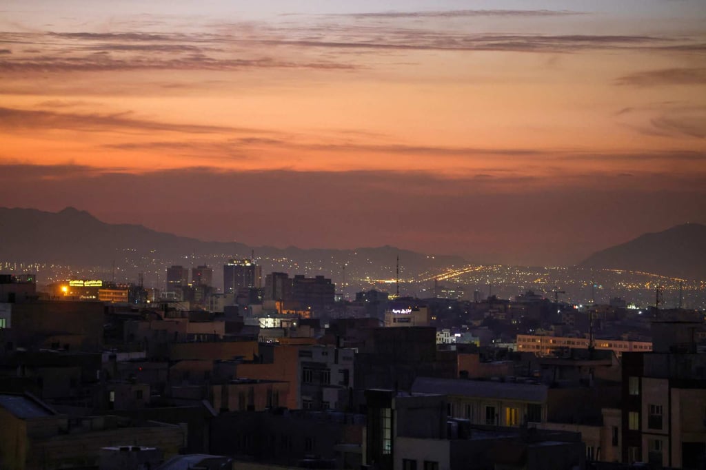 Tehran pictured at dawn on Saturday after several explosions were heard overnight in the Iranian capital. Photo: AFP Tehran pictured at dawn on Saturday after several explosions were heard overnight in the Iranian capital. Photo: AFP