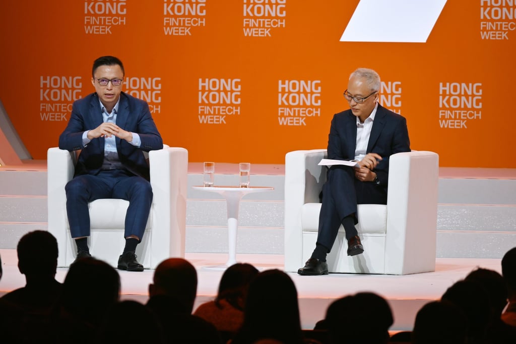 Ant Group CEO Eric Jing Xiandong (left) discusses the impact of tokenisation on cross-border settlements and Aliplay’s inroads in Hong Kong at FinTech Week on Monday. Photo: Matt Haldane