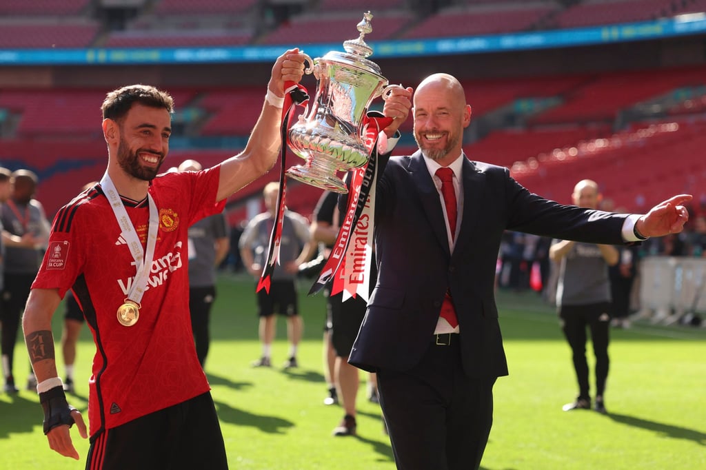 Manchester United’s head coach Erik ten Hag and Bruno Fernandes pose with the FA Cup. Photo: AP Manchester United’s head coach Erik ten Hag and Bruno Fernandes pose with the FA Cup. Photo: AP